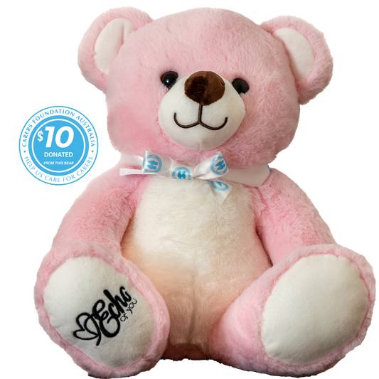Pink teddy bear with a bow tie and 'Care'a' logo on a white background
